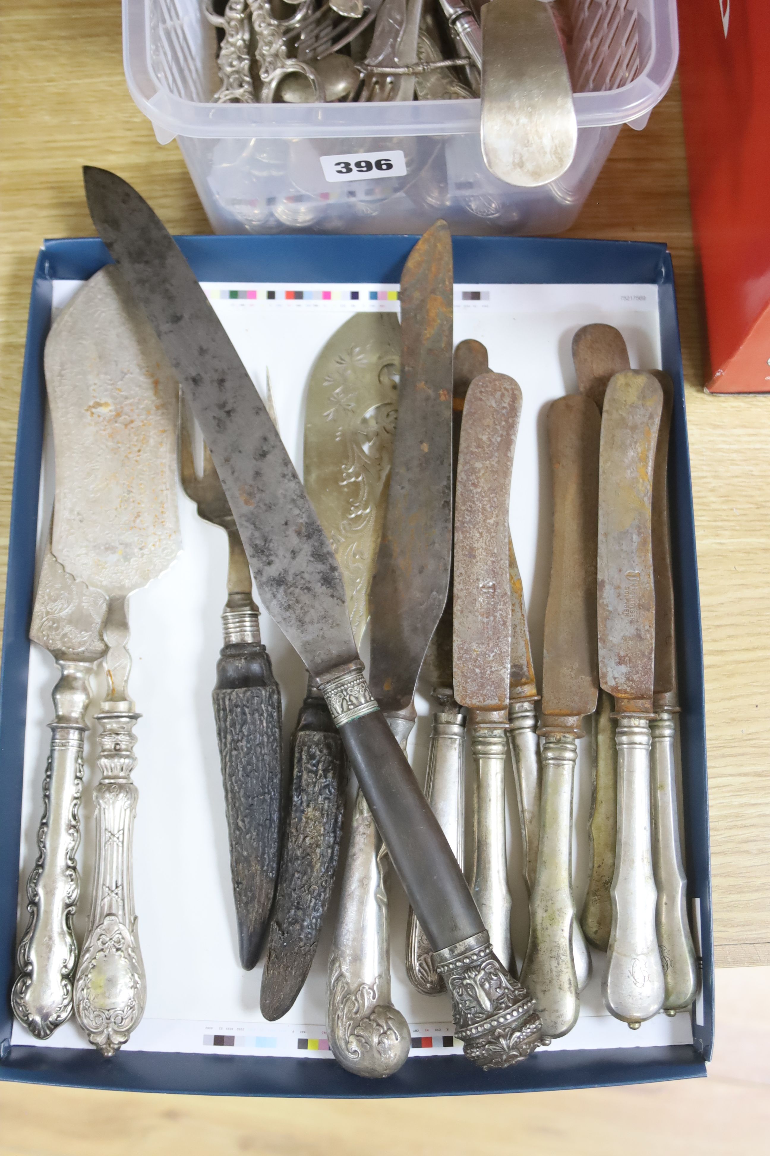 A collection of plated flatware